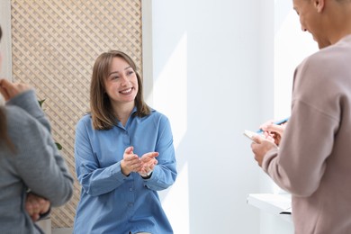 Photo of having meeting during life coaching class indoors