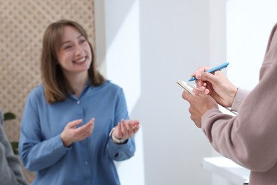 Photo of having meeting during life coaching class indoors