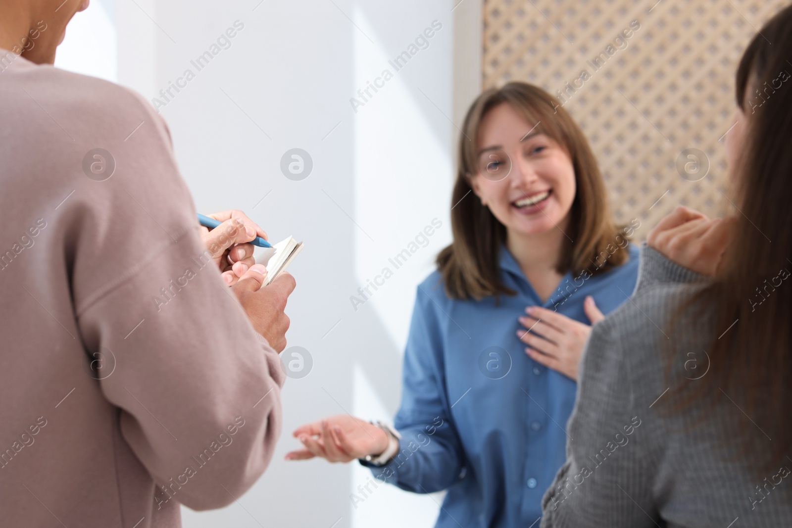 Photo of having meeting during life coaching class indoors