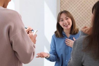 Photo of having meeting during life coaching class indoors