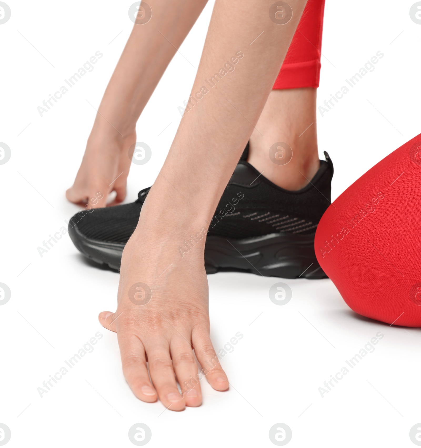 Runner in starting position on white background, closeup Photo of Runner in starting position on white background, closeup
