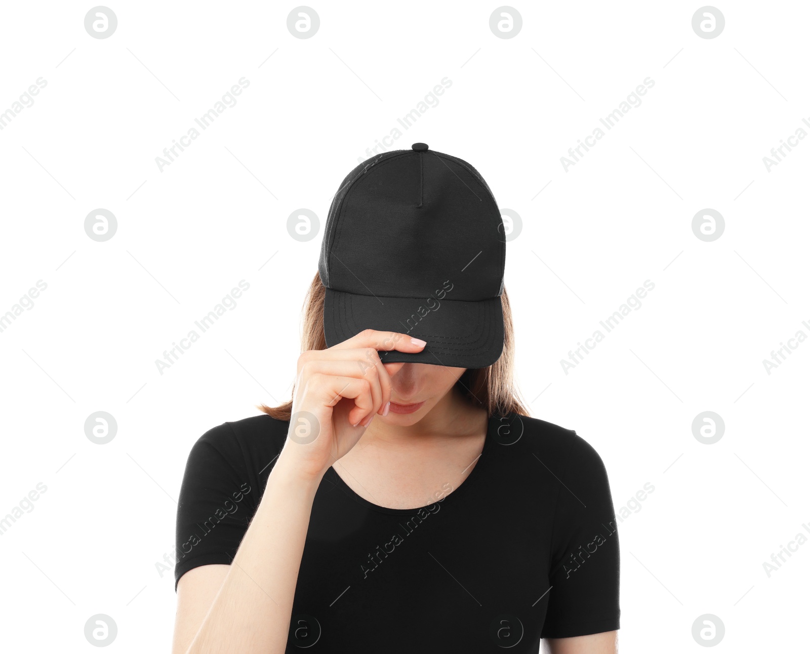 Young woman wearing stylish black baseball hat on white background Photo of Young woman wearing stylish black baseball hat on white background