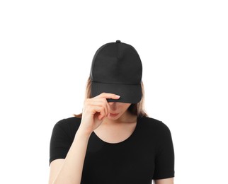 Photo of Young woman wearing stylish black baseball hat on white background