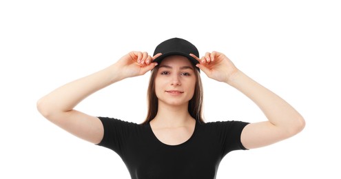 Photo of Young woman wearing stylish black baseball hat on white background
