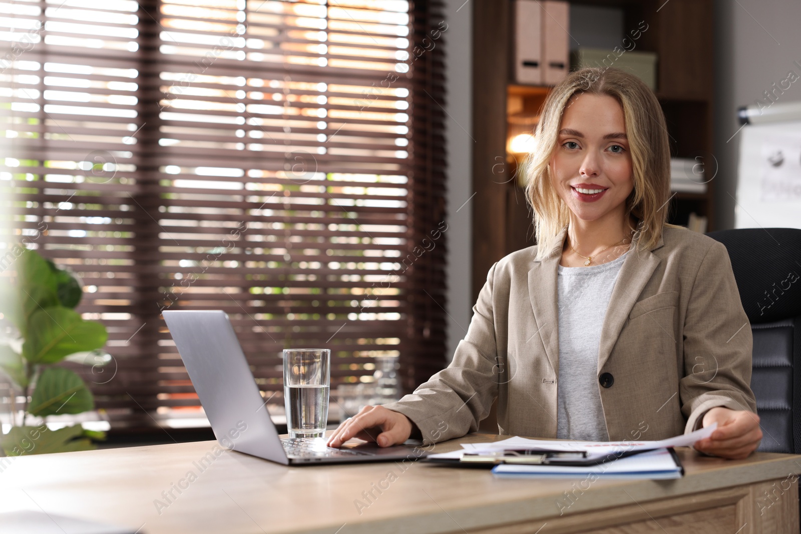 Photo of Marketing. Woman working with laptop at desk in office