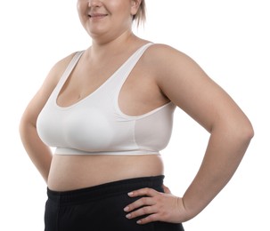 Photo of Weight loss. Plus size woman in underwear on white background, closeup