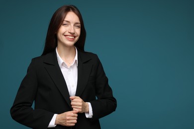 Photo of Happy woman in suit on light blue background