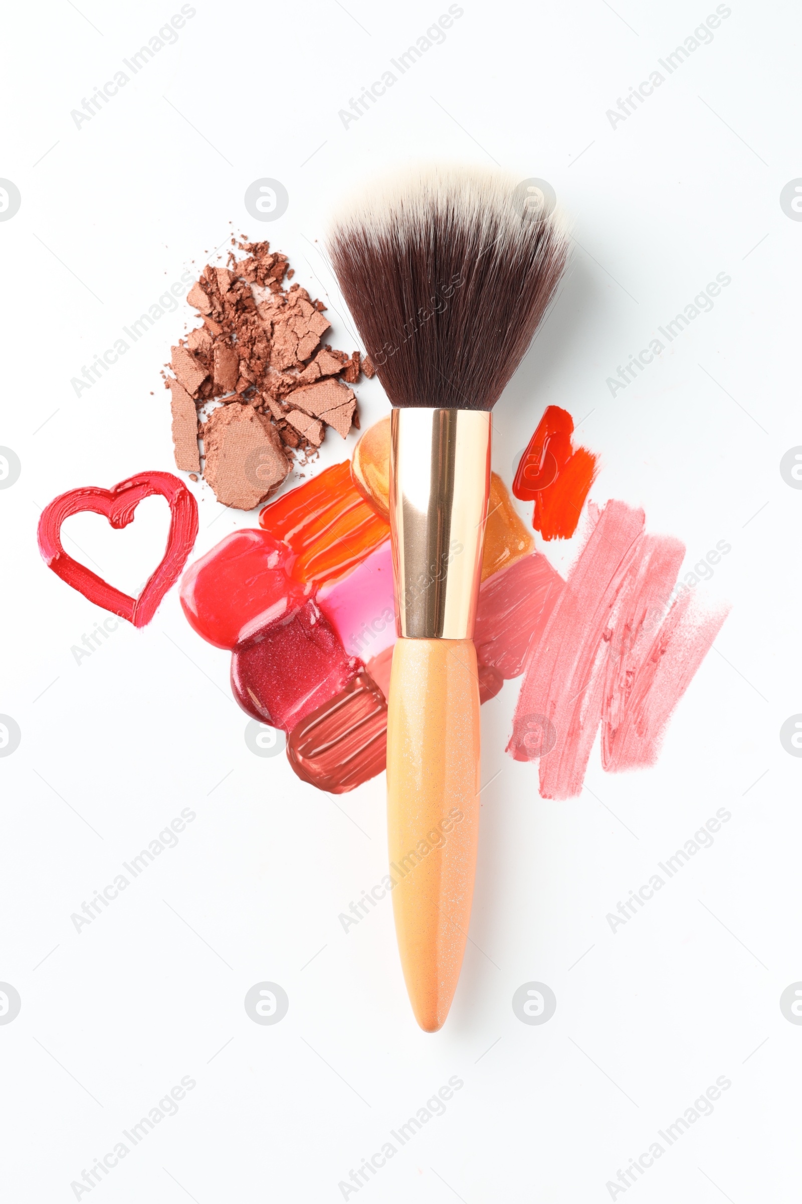 Photo of Different cosmetic products and makeup brush on white background, flat lay