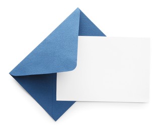Photo of Blank invitation card and envelope isolated on white, top view. Space for design