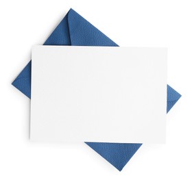 Photo of Blank invitation card and envelope isolated on white, top view. Space for design