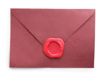Photo of Beautiful invitation envelope with wax seal isolated on white, top view