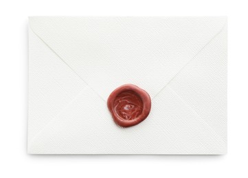 Photo of Beautiful invitation envelope with wax seal isolated on white, top view