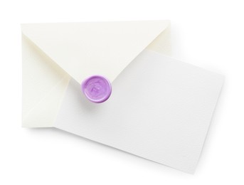 Photo of Blank invitation card and envelope isolated on white, top view. Space for design
