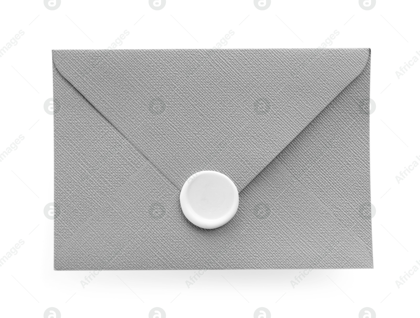 Beautiful invitation envelope with wax seal isolated on white, top view Photo of Beautiful invitation envelope with wax seal isolated on white, top view
