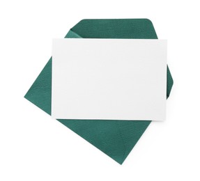 Photo of Blank invitation card and envelope isolated on white, top view. Space for design