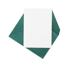 Photo of Blank invitation card and envelope isolated on white, top view. Space for design