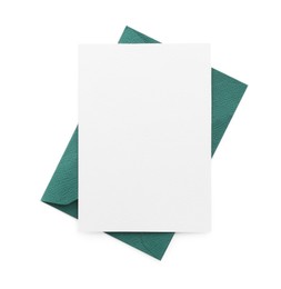 Photo of Blank invitation card and envelope isolated on white, top view. Space for design