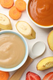 Photo of Baby food. Tasty puree in bowls and different ingredients on white wooden table, flat lay