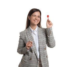 Photo of Targeting. Smiling businesswoman with dart aiming on white background