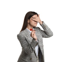 Photo of Targeting. Businesswoman with dart covering eyes on white background