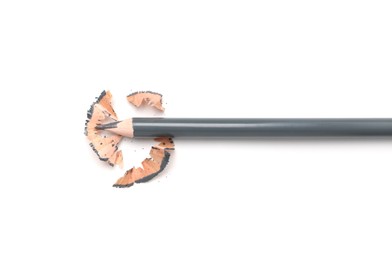 Photo of Beautiful eyebrow pencil and shavings isolated on white, top view