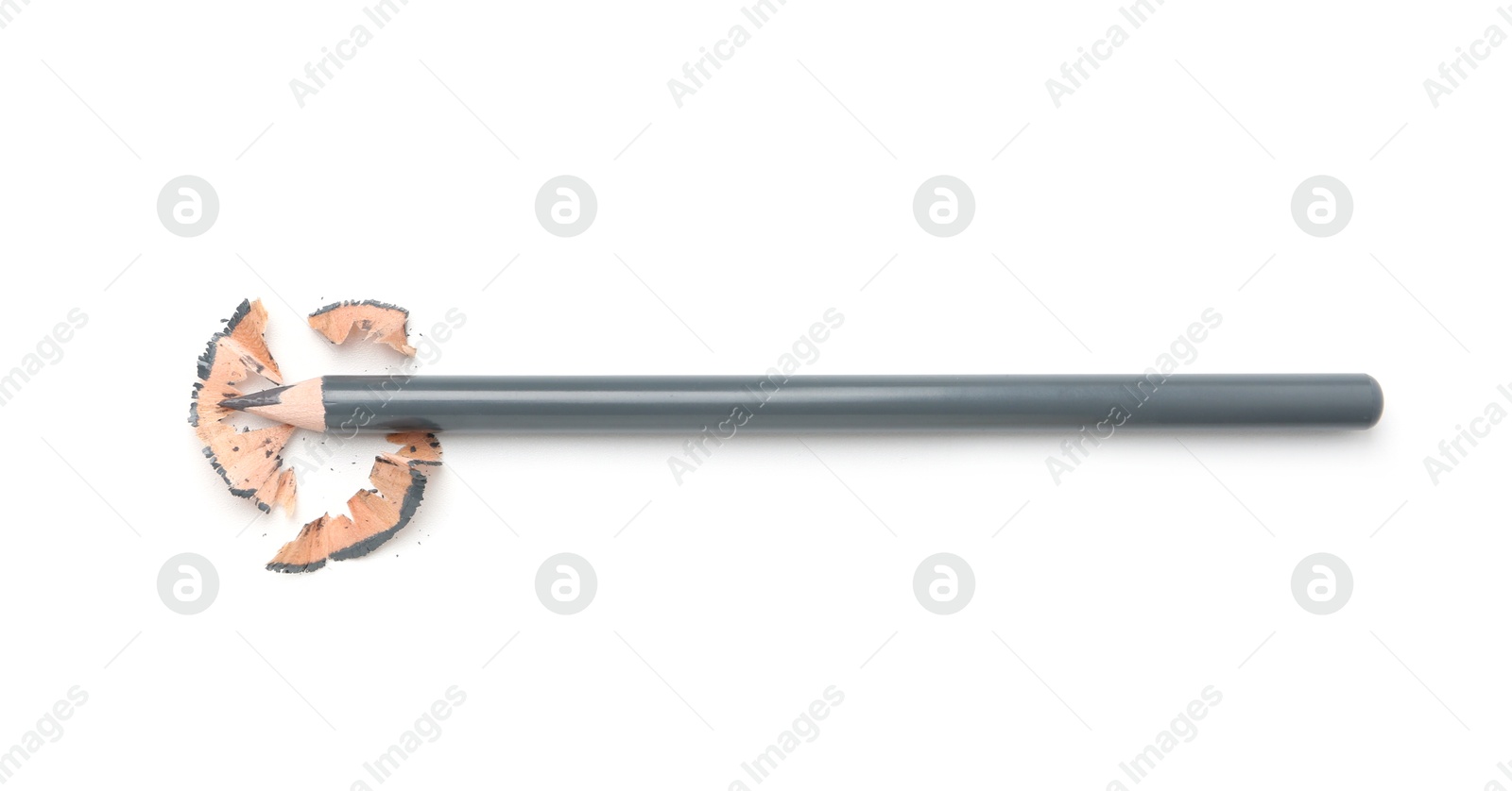 Beautiful eyebrow pencil and shavings isolated on white, top view Photo of Beautiful eyebrow pencil and shavings isolated on white, top view