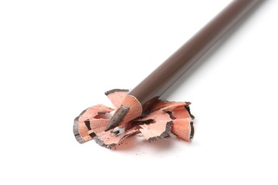 Photo of Beautiful eyebrow pencil and shavings isolated on white