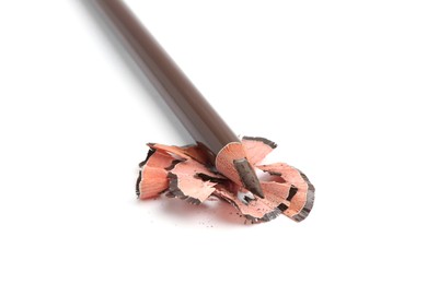 Photo of Beautiful eyebrow pencil and shavings isolated on white
