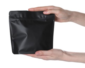 Photo of Woman with zipper stand-up pouch on white background, closeup. Mockup for design