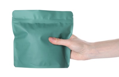Photo of Woman with zipper stand-up pouch on white background, closeup. Mockup for design