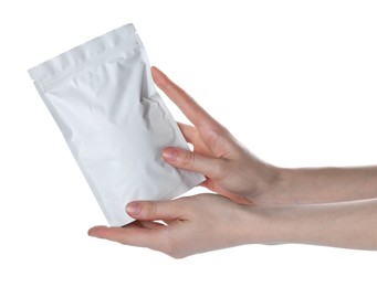 Photo of Woman with zipper stand-up pouch on white background, closeup. Mockup for design