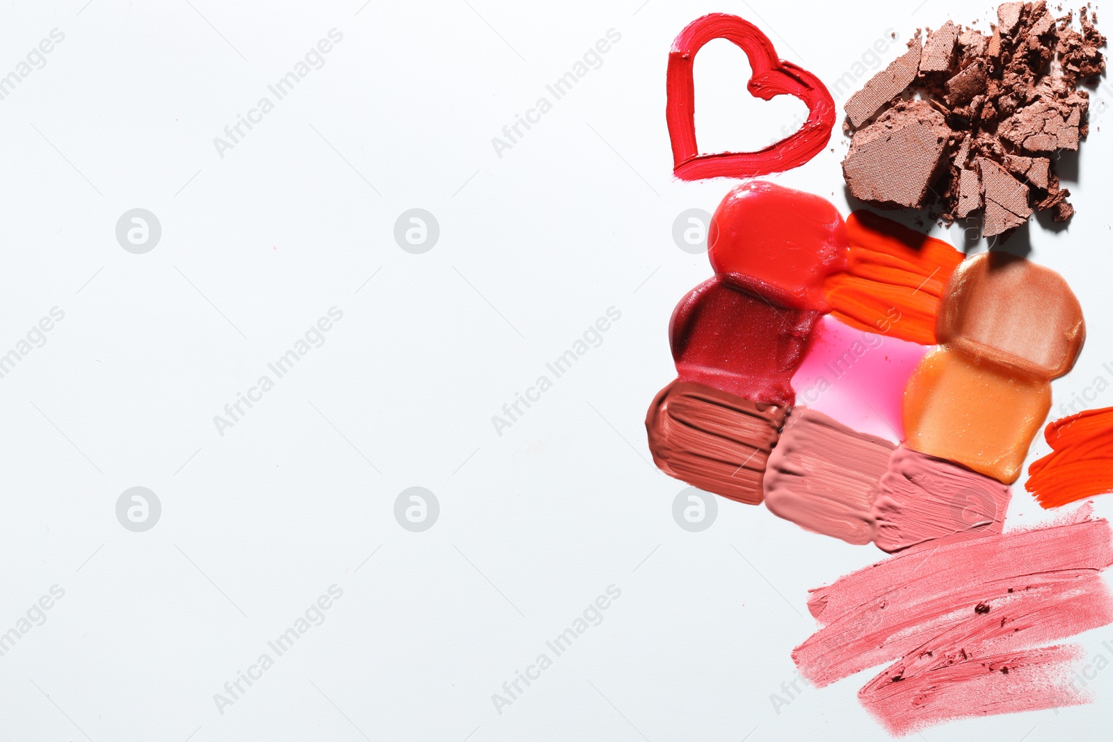 Different cosmetic products on white background, flat lay. Space for text Photo of Different cosmetic products on white background, flat lay. Space for text