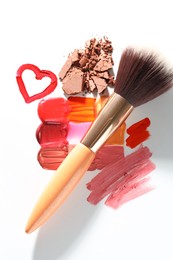 Photo of Different cosmetic products and makeup brush on white background, flat lay