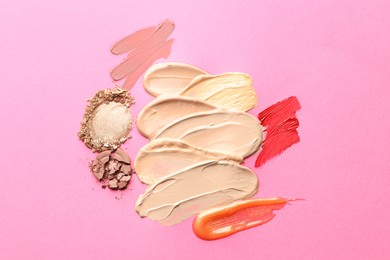 Photo of Different cosmetic products on magenta background, flat lay