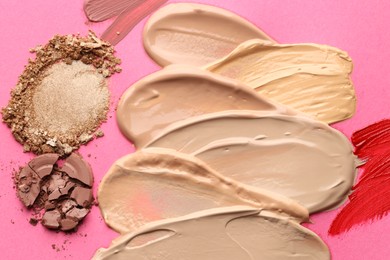 Photo of Different cosmetic products on magenta background, flat lay