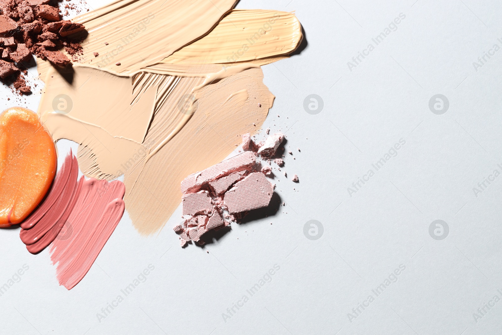 Different cosmetic products on white background, flat lay. Space for text Photo of Different cosmetic products on white background, flat lay. Space for text