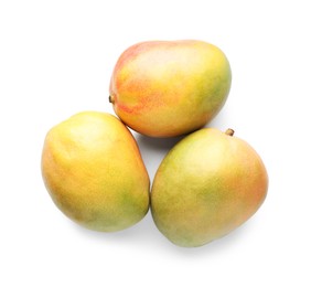 Photo of Fresh ripe mangos isolated on white, top view