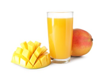 Photo of Tasty mango juice in glass and fresh fruits isolated on white