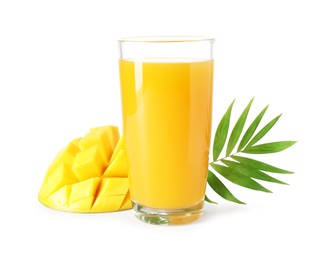 Photo of Tasty mango juice in glass and fresh fruit isolated on white