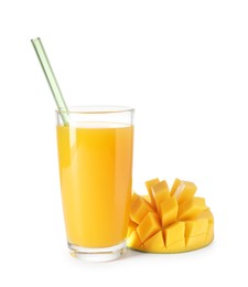 Photo of Tasty mango juice in glass and fresh fruit isolated on white