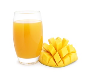 Photo of Tasty mango juice in glass and fresh fruit isolated on white