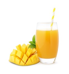 Photo of Tasty mango juice in glass and fresh fruit isolated on white