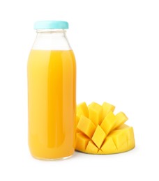 Photo of Tasty mango juice in glass and fresh fruit isolated on white