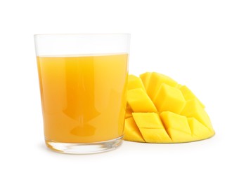 Photo of Tasty mango juice in glass and fresh fruit isolated on white