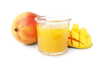 Photo of Tasty mango juice in glass and fresh fruits isolated on white