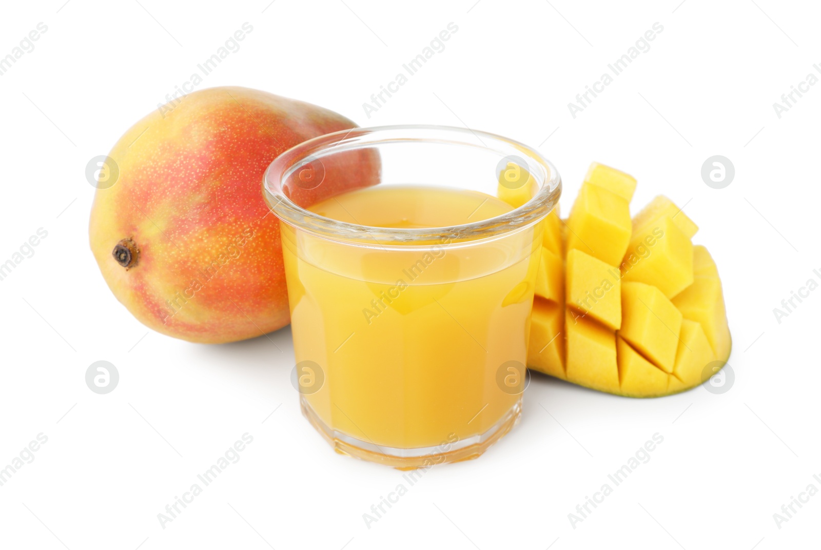Tasty mango juice in glass and fresh fruits isolated on white Photo of Tasty mango juice in glass and fresh fruits isolated on white