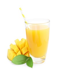 Photo of Tasty mango juice in glass and fresh fruit isolated on white