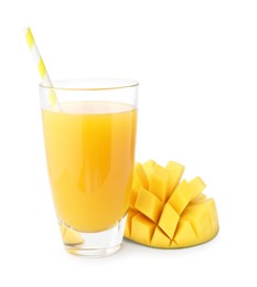 Photo of Tasty mango juice in glass and fresh fruit isolated on white