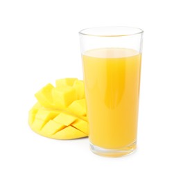Photo of Tasty mango juice in glass and fresh fruit isolated on white