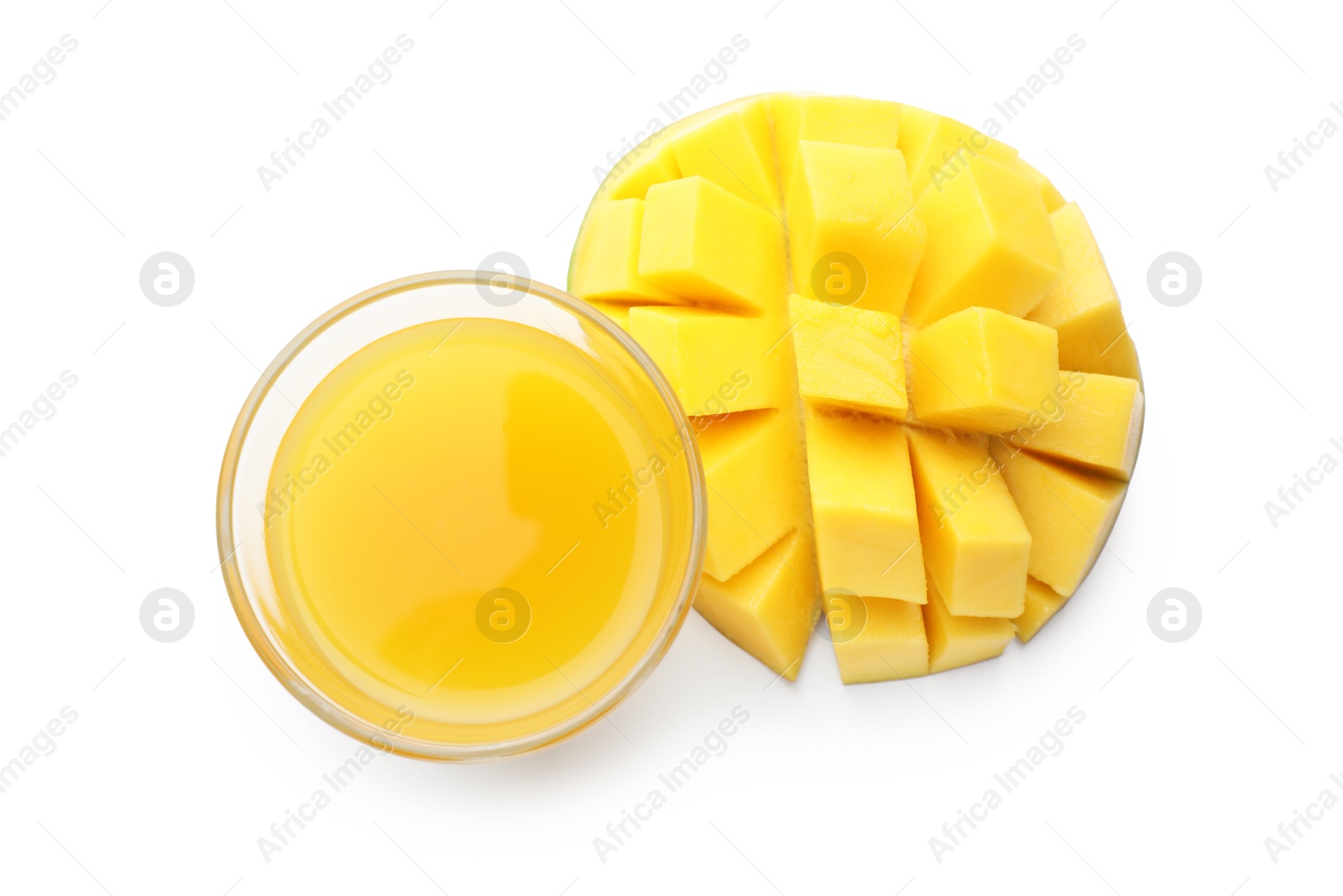 Tasty mango juice in glass and fresh fruit isolated on white, top view Photo of Tasty mango juice in glass and fresh fruit isolated on white, top view